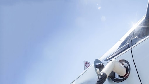 A fuel pump in the tank of a car under a blue sky